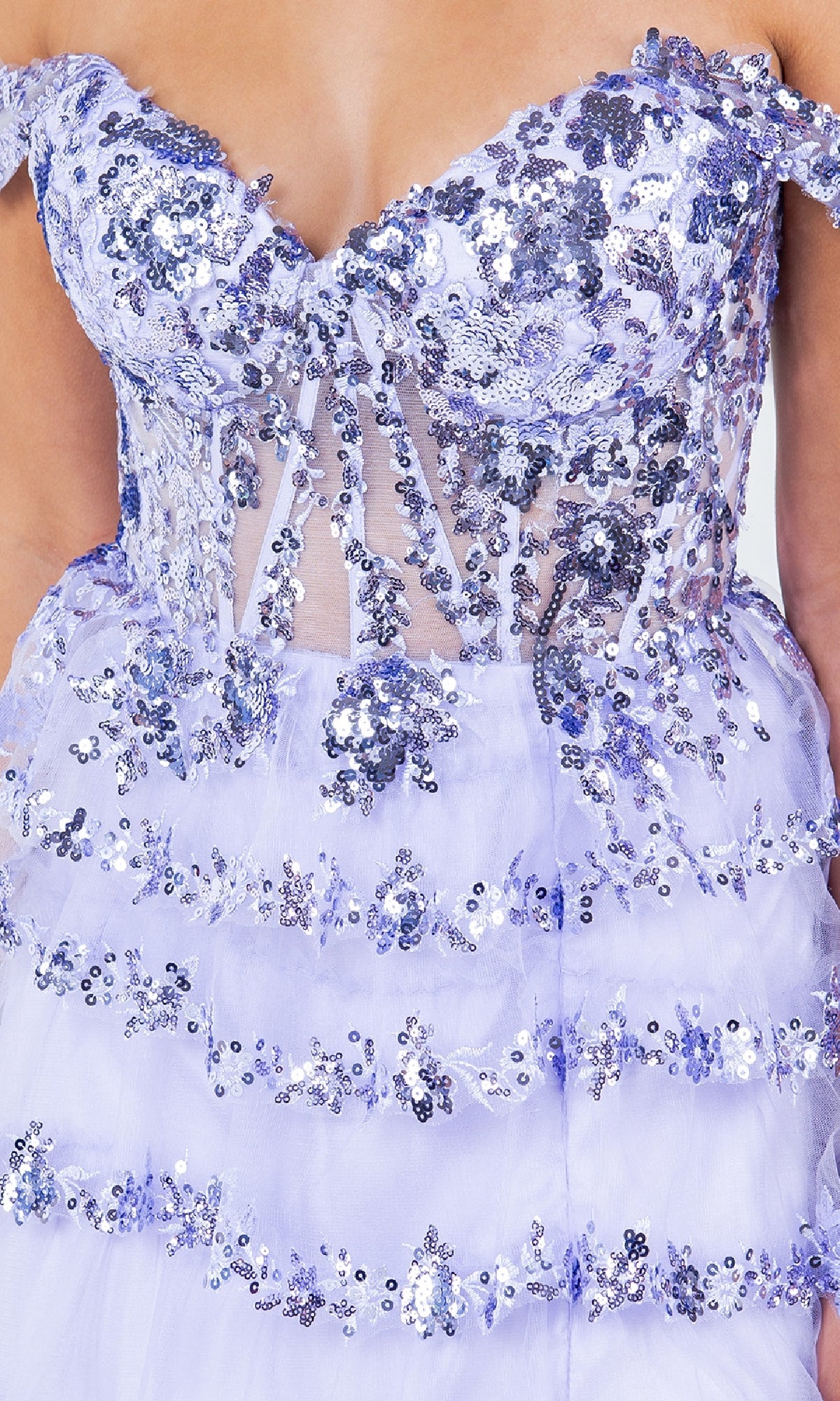 Close-up of the Ruffle Prom Ball Gown: Cinderella Couture 8228J in lavender, featuring an off-the-shoulder design, sheer panels, and intricate sequin floral embroidery.